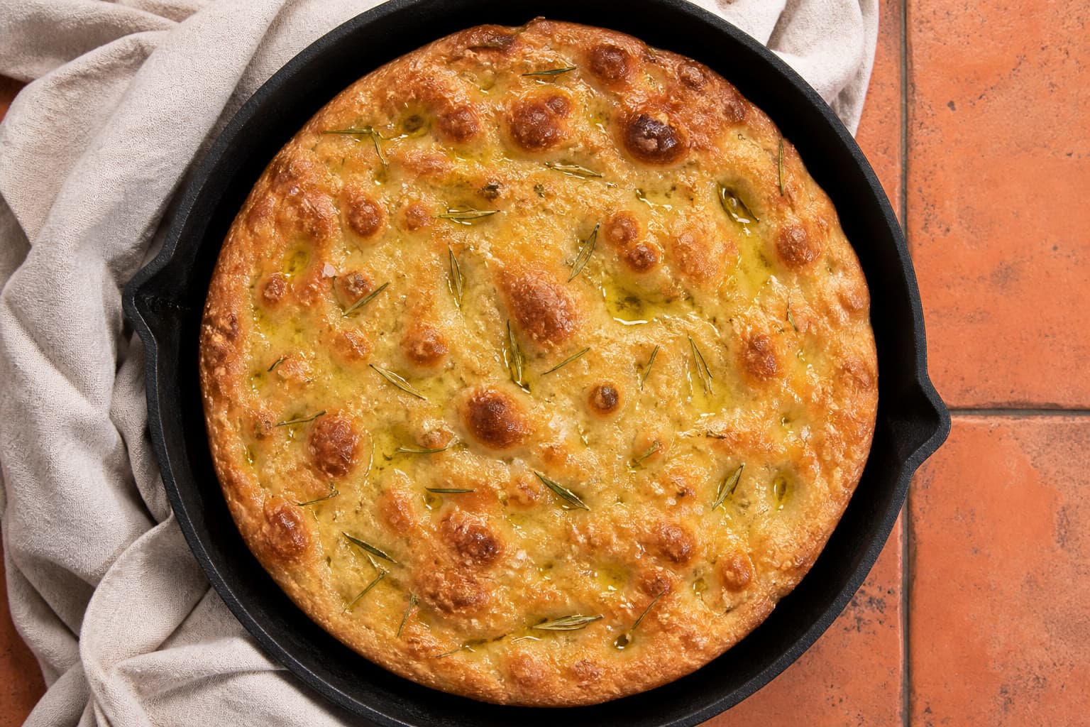 Olive-oil blistered gluten-free sourdough focaccia with rosemary